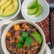 Black Bean Sweet Potato Chili with avo and lime overhead view with fork