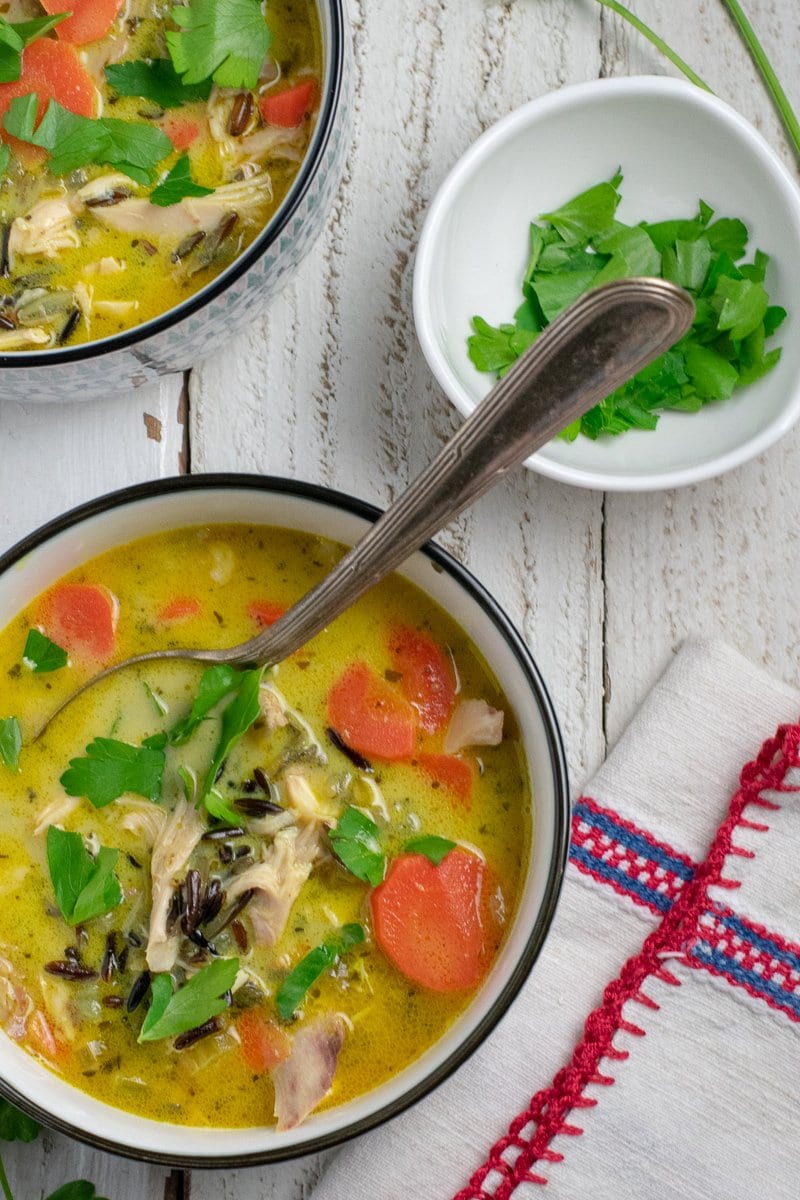 Chicken Black Rice Soup in patterned bowls overhead view