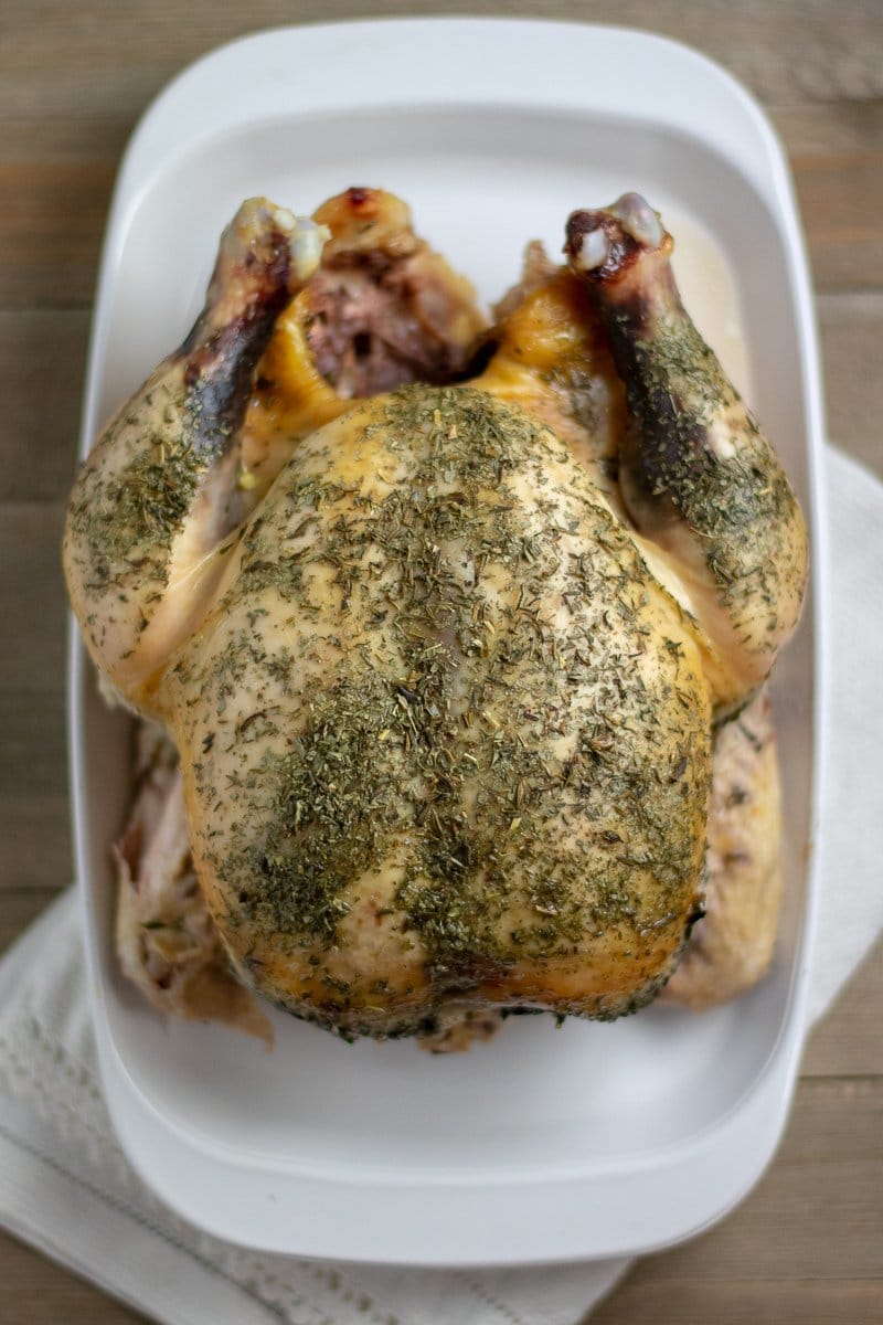 Instant Pot roasted chicken on rectangular white platter