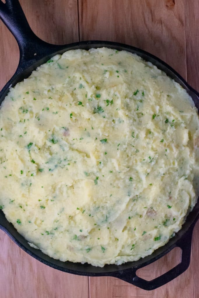 Beef Shepherd's Pie with potato topping in iron skillet