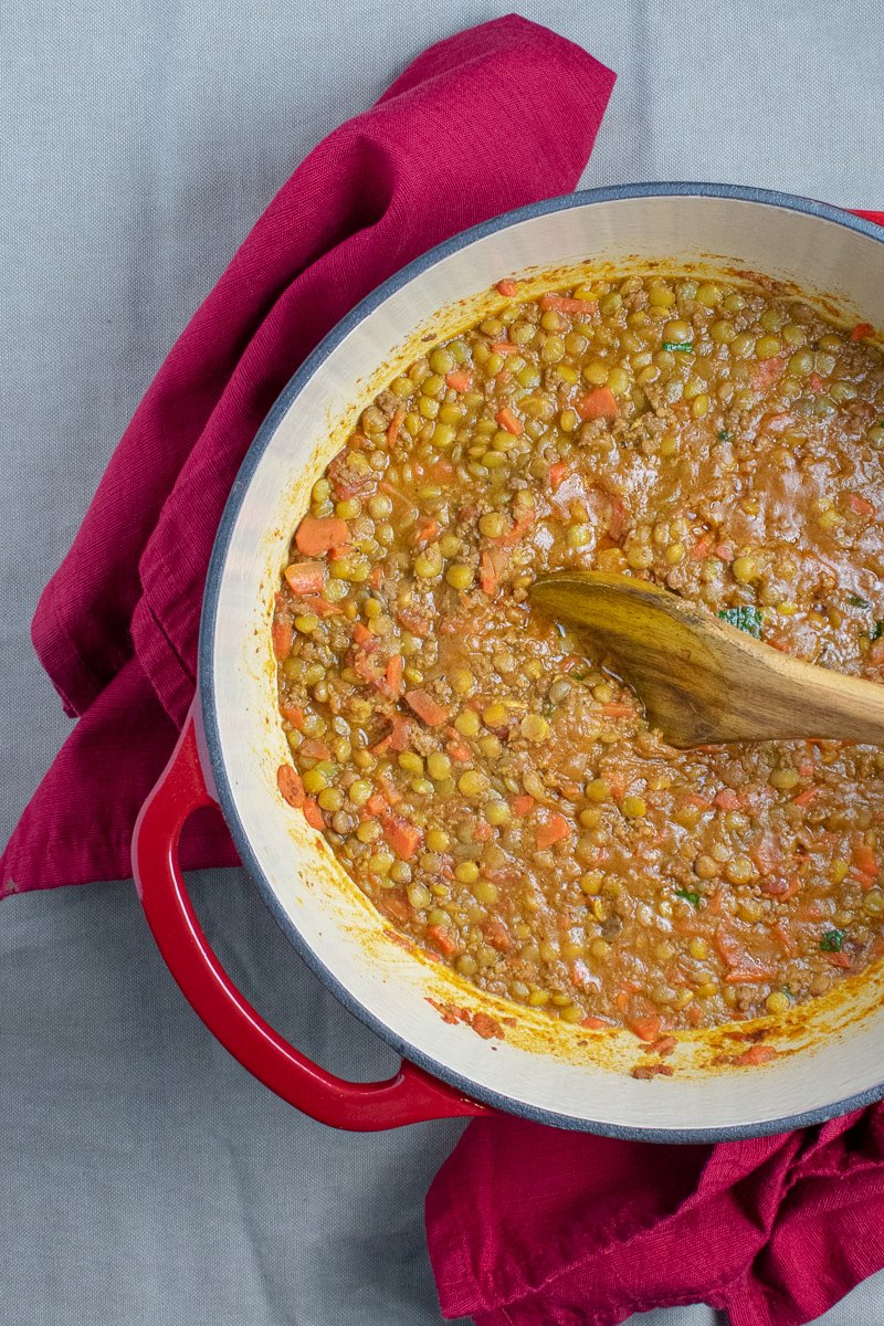 Spiced Lentils with Beef in red dutch oven