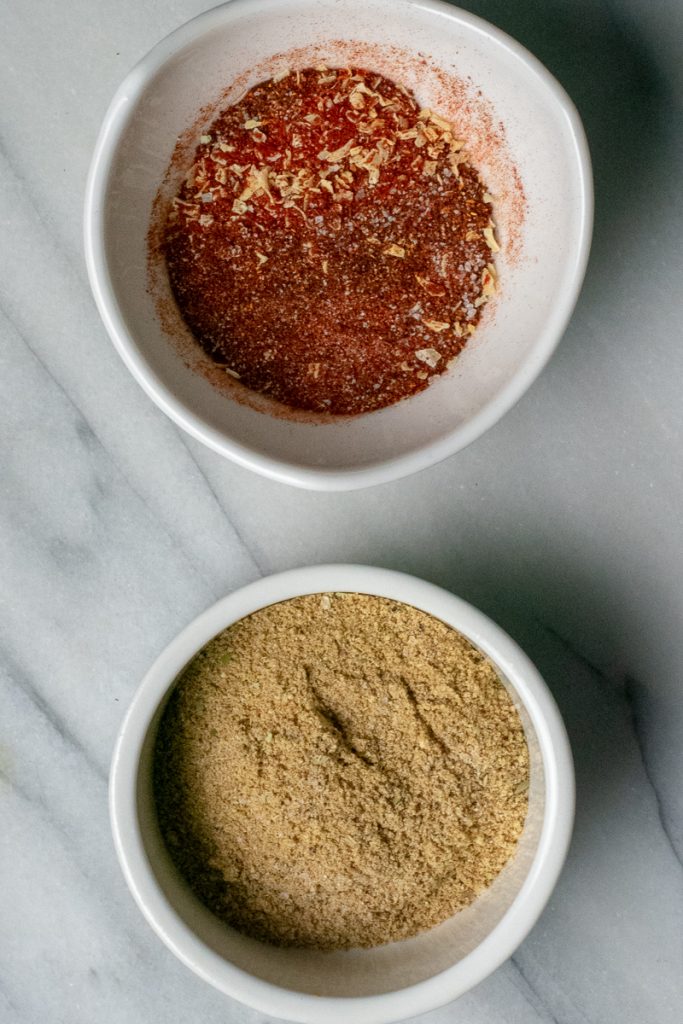 Gluten-free taco seasonings in white bowls