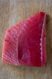 opah fillet on bamboo board