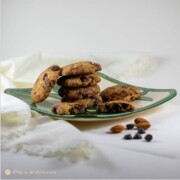 almond flour dark chocolate chip cookies on hawaiian plate side view