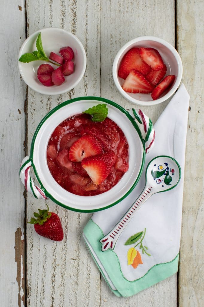 strawberry rhubarb mint compote with fruits in small bowls