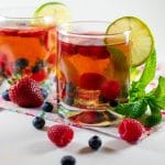 easy fruit infused herbal tea in clear glasses with lime slices
