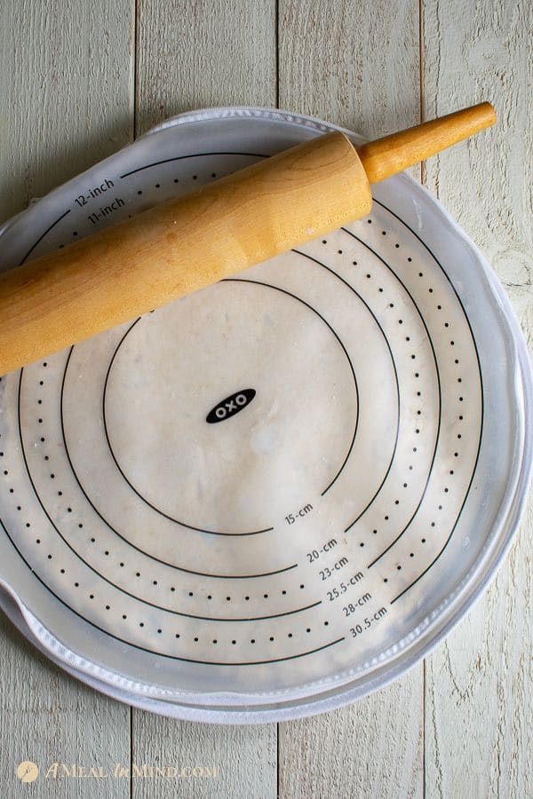 rolling the coconut oil pie crust gluten-free in pie crust bag