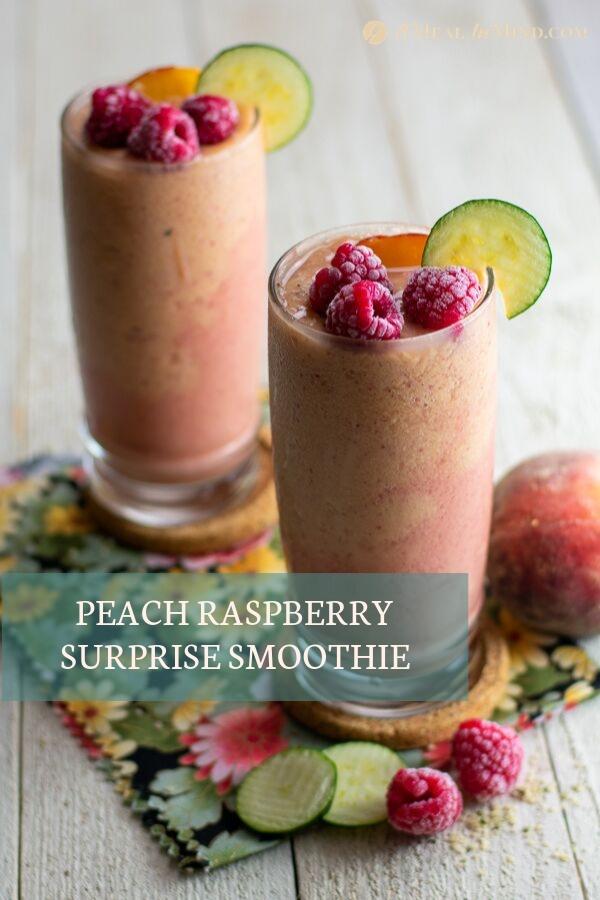 Peach raspberry surprise smoothies in tall glasses from side