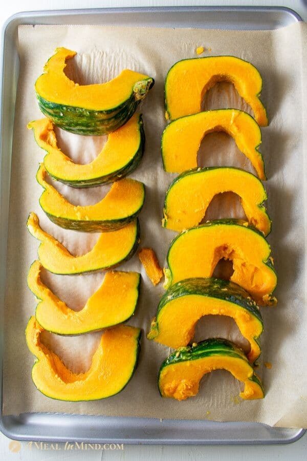 roasted kabocha with black sesame not yet baked on baking tray