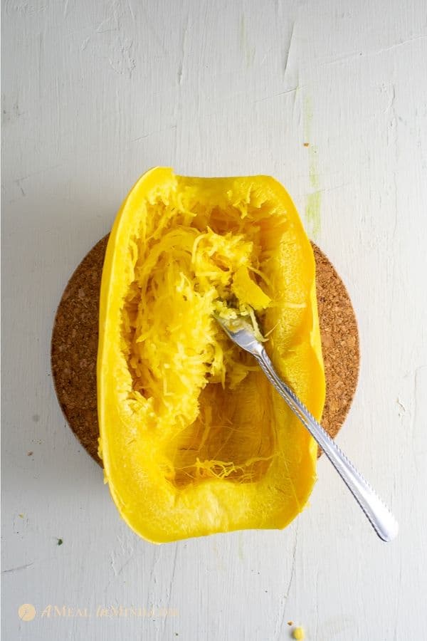 removing threads from squash for gluten-free spaghetti squash Greek pastitsio