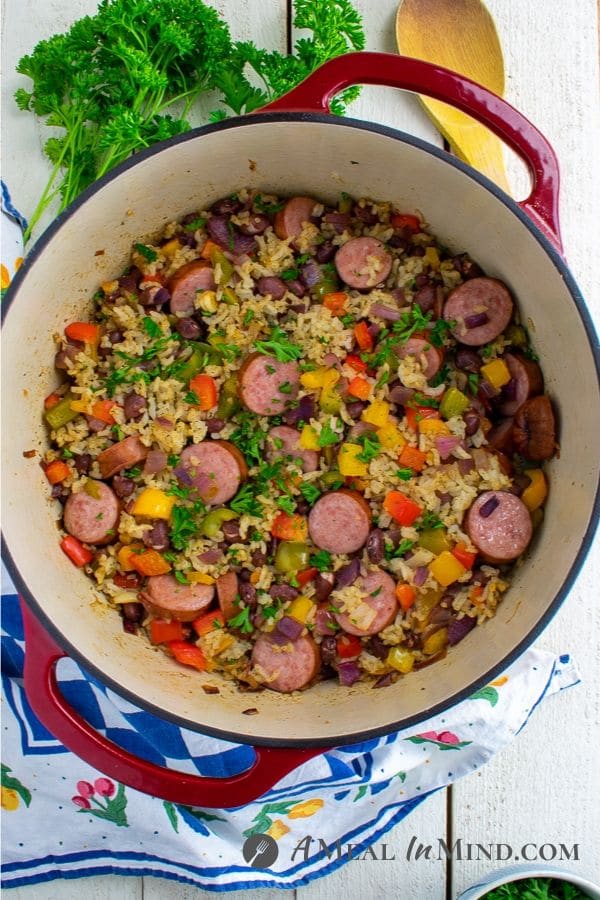 dirty rice vegetable sausage bake overhead view in dutch oven