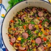 dirty rice sausage bake in cast iron dutch oven