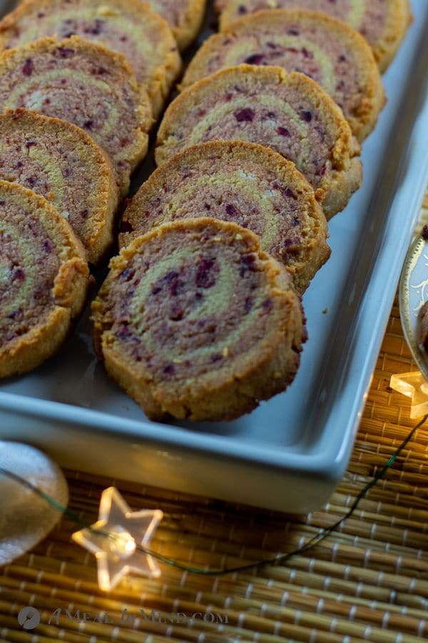 close-up of baked cranberry almond-flour pinwheel cookies