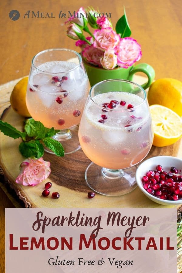 sparkling Meyer lemon mocktail in glasses with pomegranate seeds