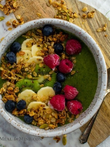 Chia-Greens Peach Smoothie Bowl with fruit garnishes