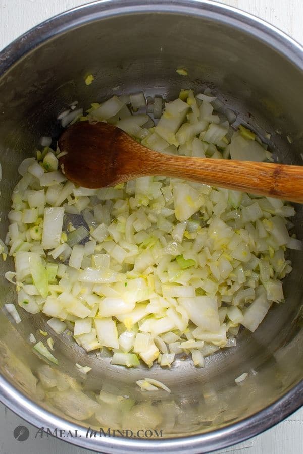 Instant Pot Swiss Chard Saag onions sauteing in pot