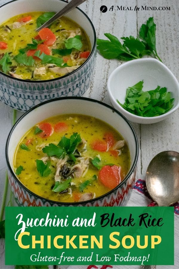 Chicken, Black Rice and Zucchini Soup in patterned bowls