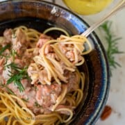 Garlic-Pecan-Salmon Pasta in ceramic bowl