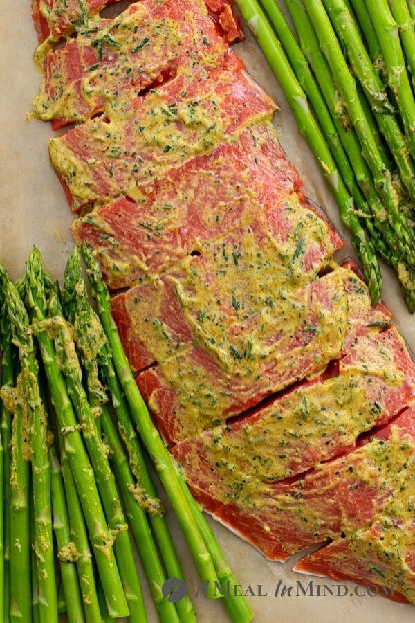 Pecan Mustard Salmon with Asparagus on baking pan