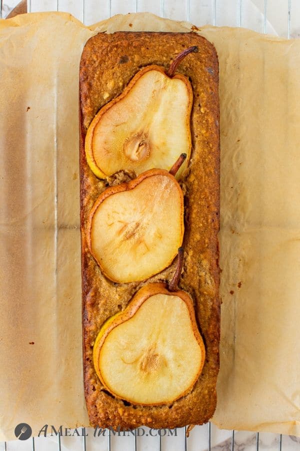 Walnut-Ginger Pear Bread baked and with parchment partly removed