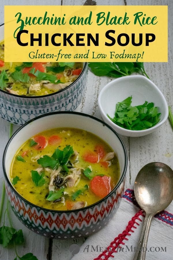 Chicken, Black Rice and Zucchini Soup in patterned bowls