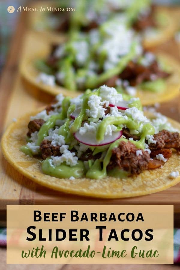 Beef Barbacoa Slider Tacos with Avocado Lime Guac on wooden plank