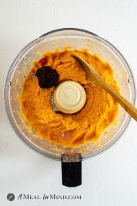 Moroccan Roasted-Carrot Hummus with harissa in food processor