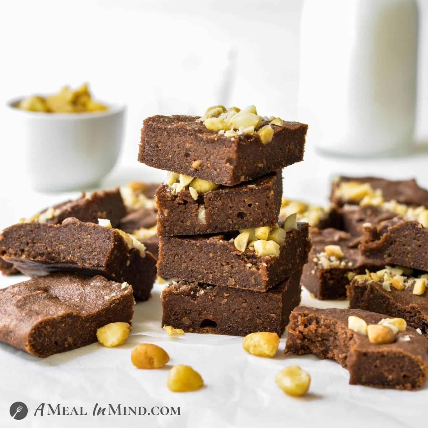 Macadamia Nut"Ella" Brownies 3 Ingredient stacked on table