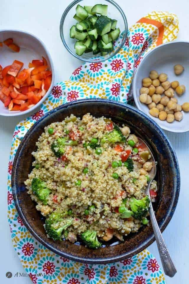 Mexican Quinoa Bowl with small bowls of garnishes