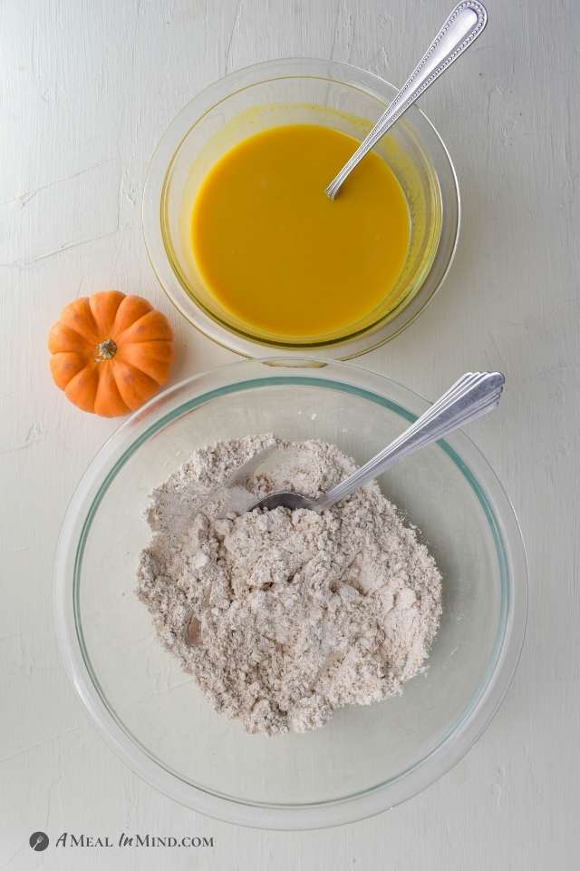 Pumpkin Protein Pancakes dry and wet ingredients mixed in bowls