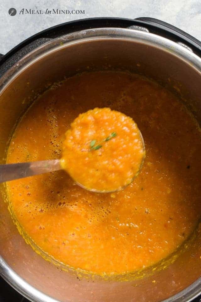 close-up of spoonful of roasted butternut tomato soup