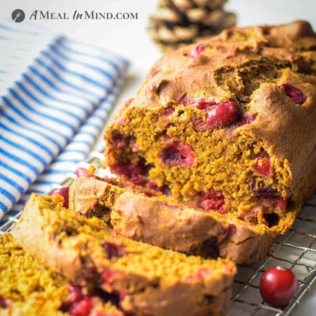 cranberry pumpkin bread on wire rack