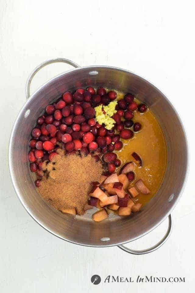 Gingered Cranberry Plum Sauce ingredients in soup pot