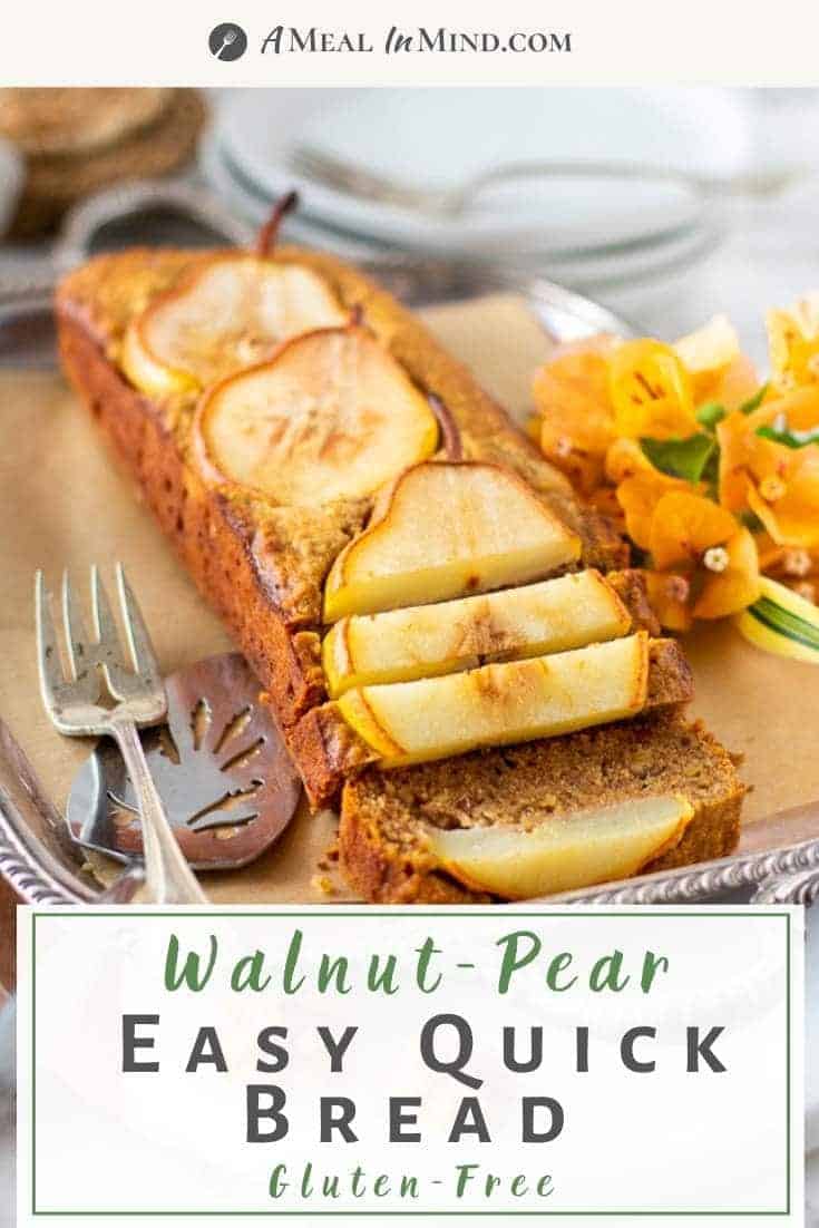 walnut ginger pear bread sliced on silver tray