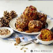 Cranberry-Pecan Pumpkin Muffins on white plate