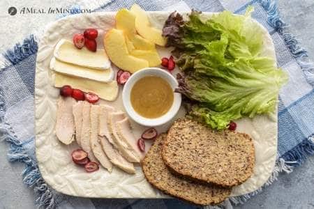 ingredients for chicken-apple-brie sandwich on platter