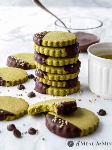 stack of chocolate-dipped matcha cookies