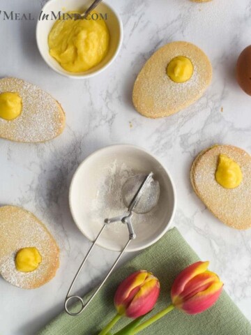 egg-shaped Paleo easter cookies filled with lemon curd